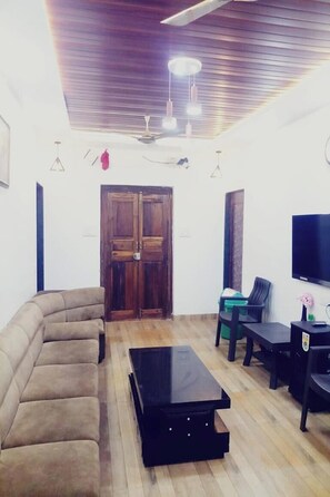 32-inch flat-screen TV with cable channels