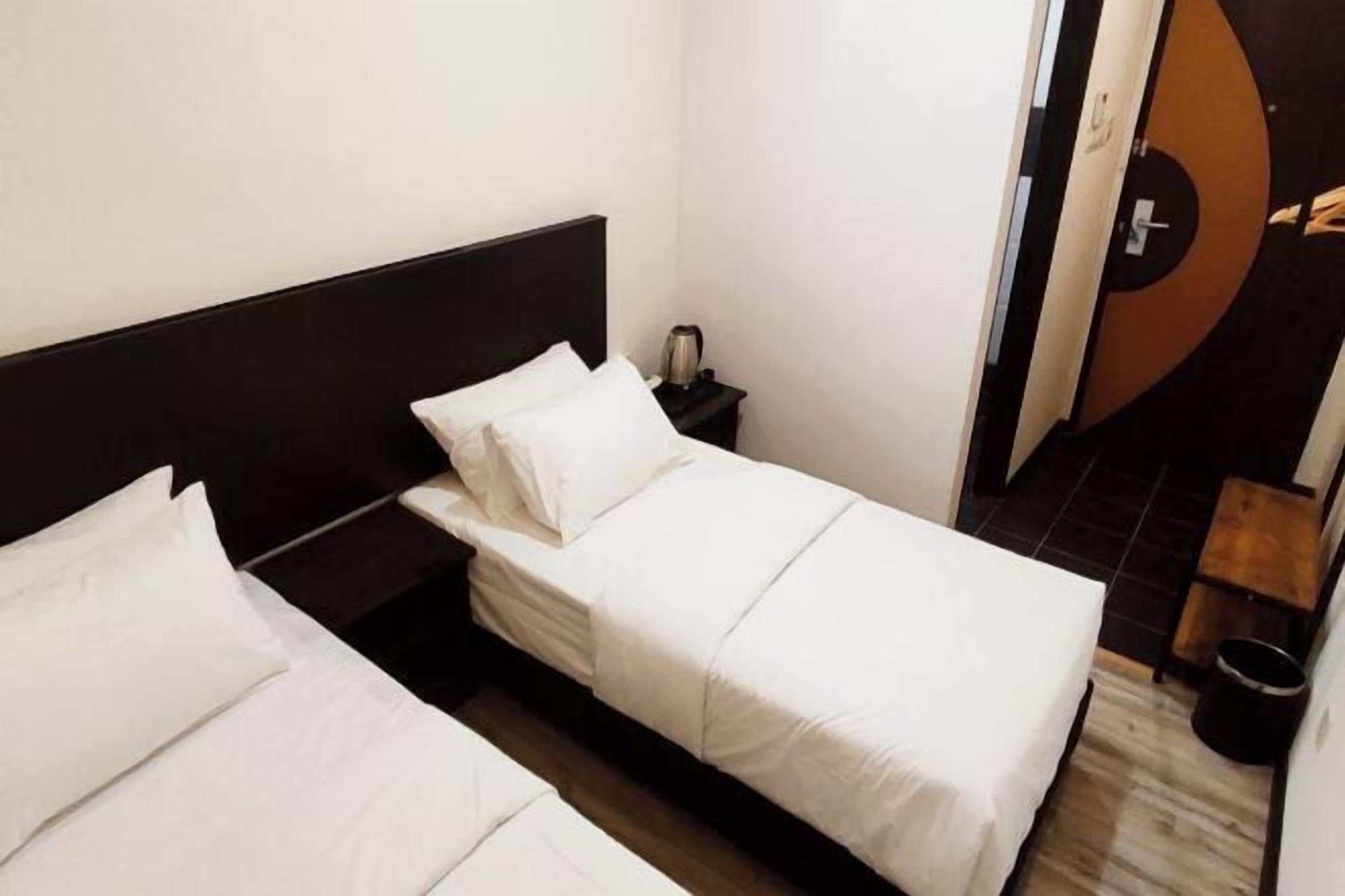 Minibar, desk, blackout drapes, iron/ironing board