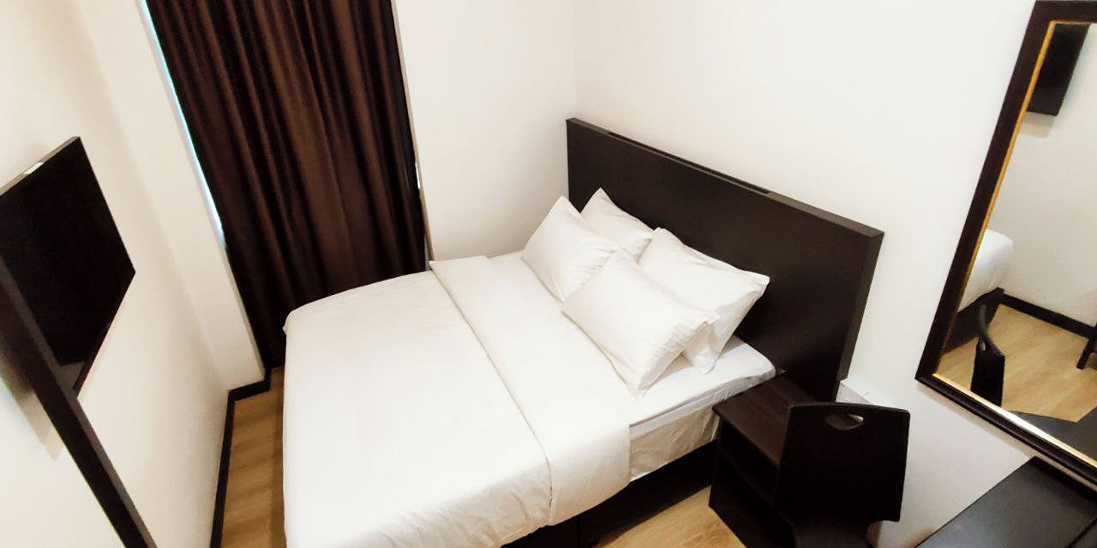 Minibar, desk, blackout curtains, iron/ironing board