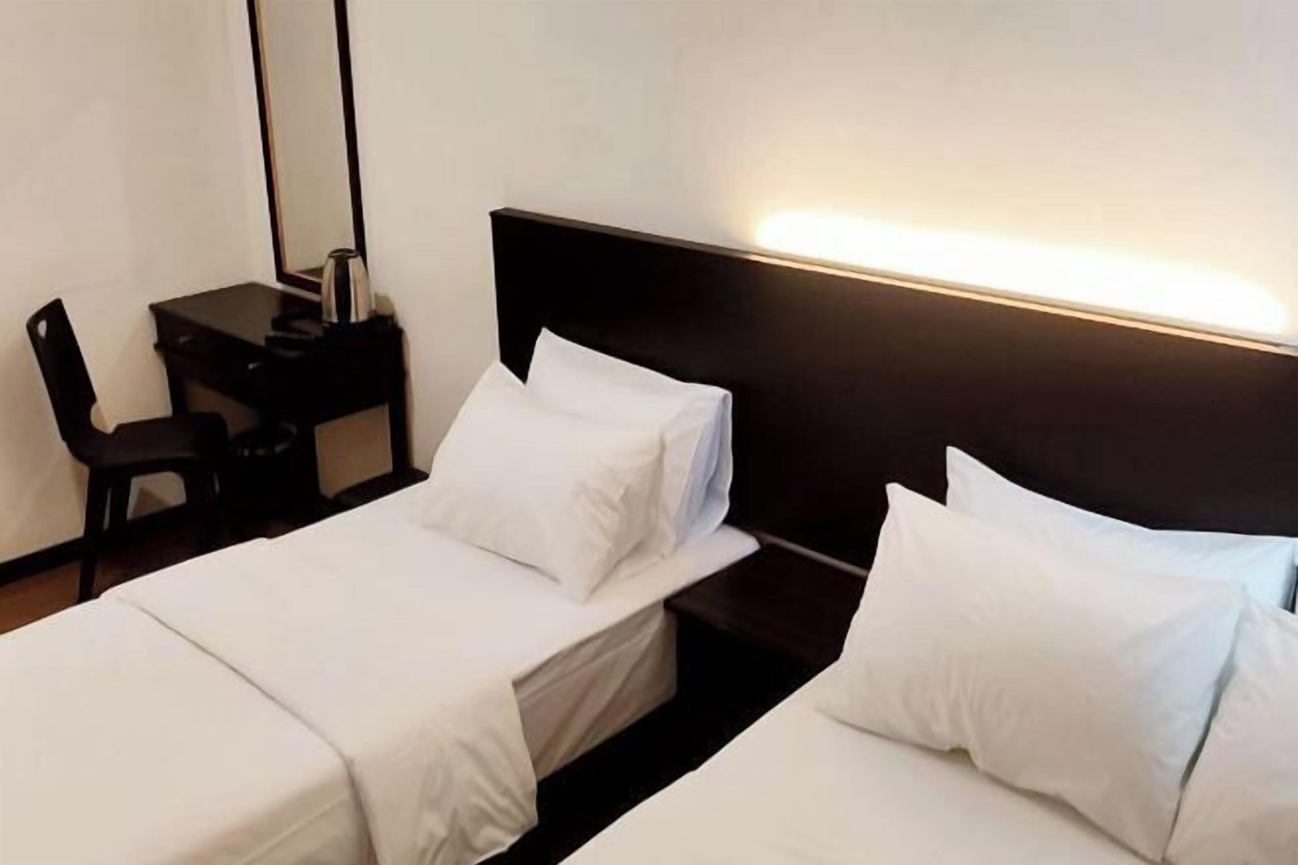 Minibar, desk, blackout drapes, iron/ironing board