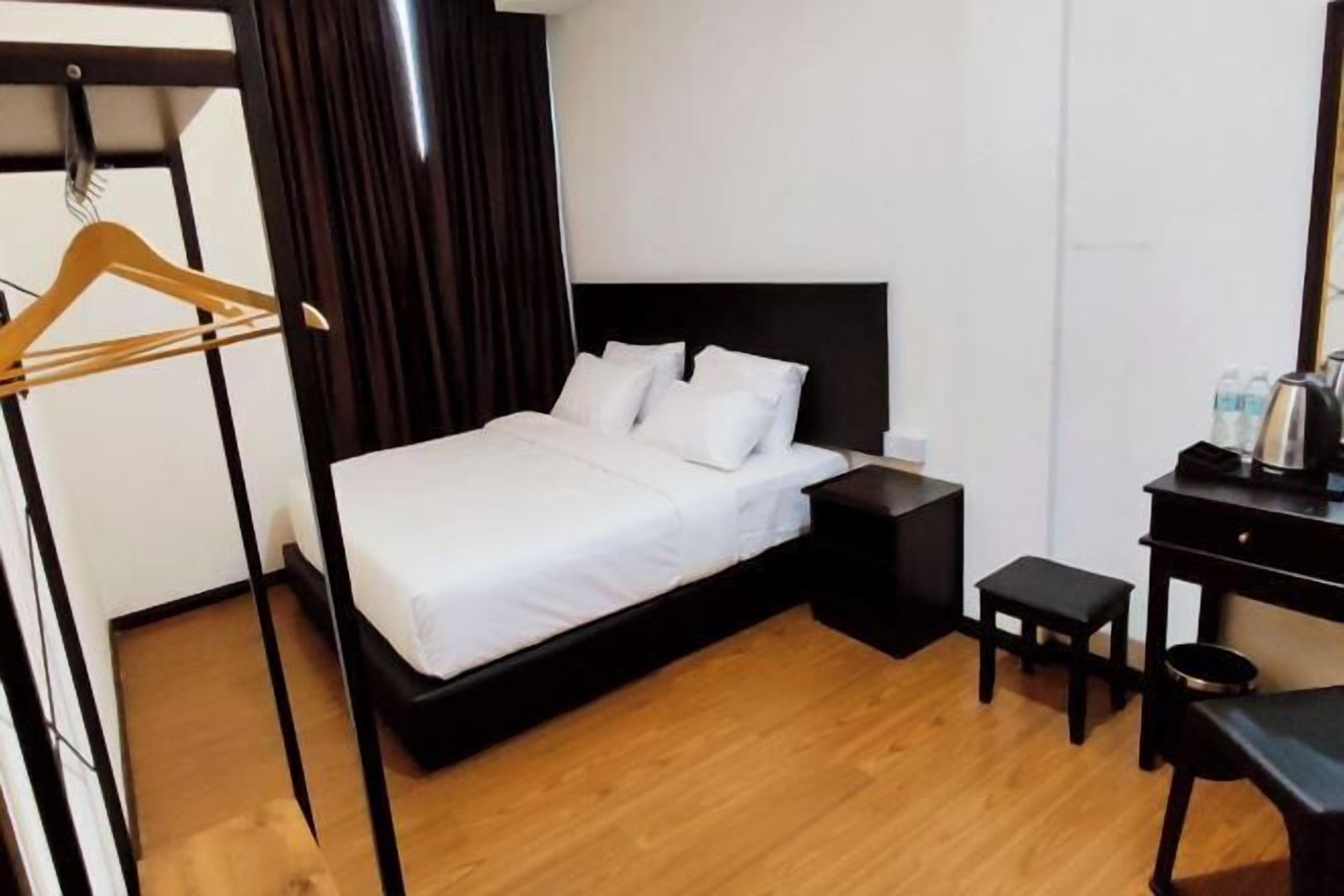 Minibar, desk, blackout drapes, iron/ironing board