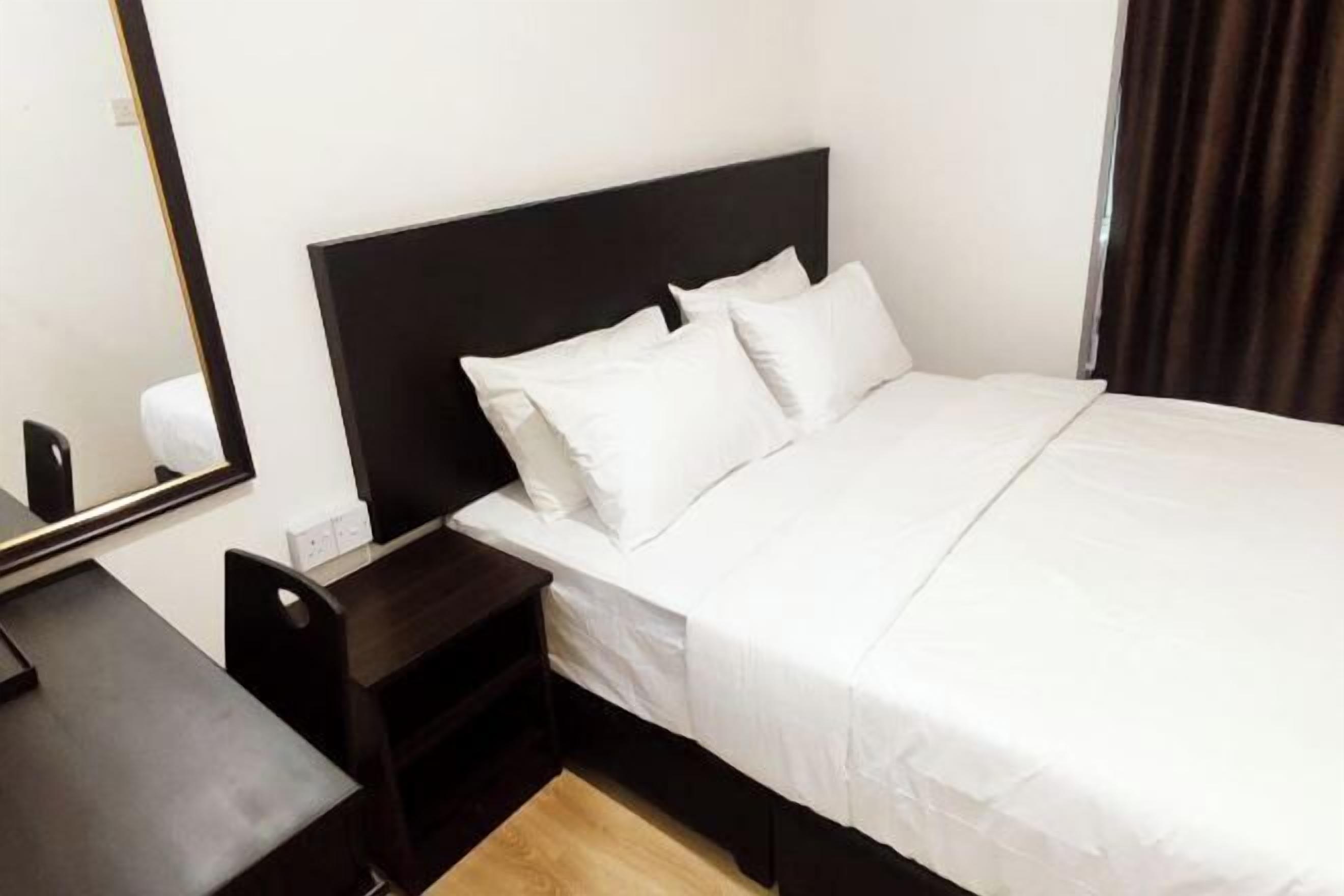 Minibar, desk, blackout drapes, iron/ironing board