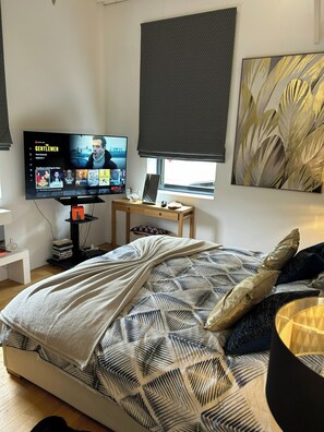 1 habitación, tabla de planchar con plancha, wifi gratis y ropa de cama 