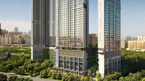 A high-rise building with multiple floors, large windows, and a modern architectural design. - AGILE Service Residence by Sha (Kuala Lumpur)