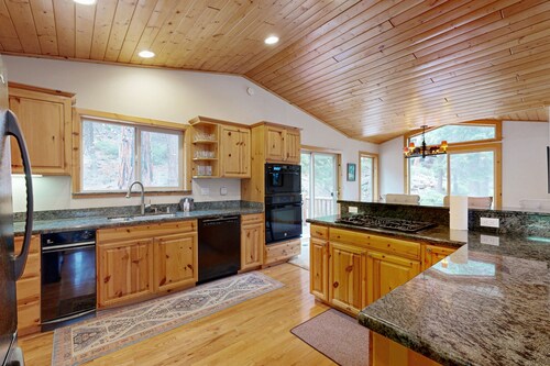 Spacious home with fireplace and two decks with hot tub & bbq grill