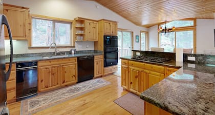 Spacious home with fireplace and two decks with hot tub & bbq grill