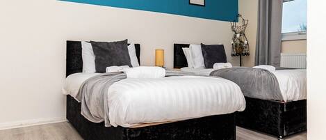 4 dormitorios, tabla de planchar con plancha, wifi gratis y ropa de cama