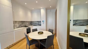 Apartamento Deluxe | Comedor
