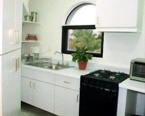 Fridge, oven, cookware/dishes/utensils