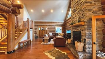 Smart TV, fireplace, table football, books