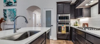 Amazing upgraded masterpiece with a nice gym upstairs, full kitchen, and games!