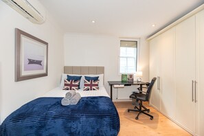 2 dormitorios, tabla de planchar con plancha, cuna de viaje y wifi