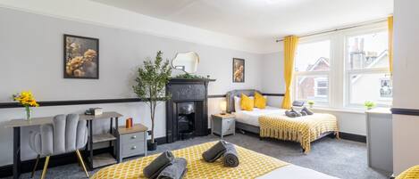 2 dormitorios, tabla de planchar con plancha, wifi gratis y ropa de cama
