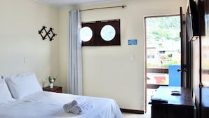 Family Room, Hill View | Blackout drapes, iron/ironing board (on request), WiFi (free) - CASA DO LEÃO POUSADA (Arraial do Cabo)