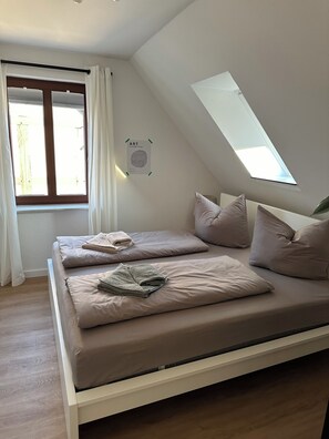 2 bedrooms, travel crib, WiFi, bed sheets