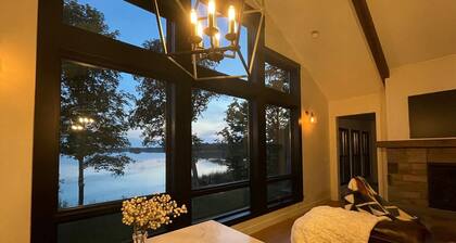 New, stunning modern lake home with private swimming beach and dock