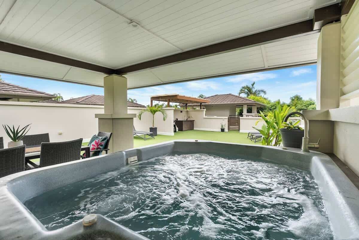 Immerse yourself in relaxation with a soothing hot tub experience, surrounded by invigorating outdoor breezes.
