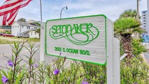 A sign for 'Spinnaker' at 3513 S. Ocean Blvd.
