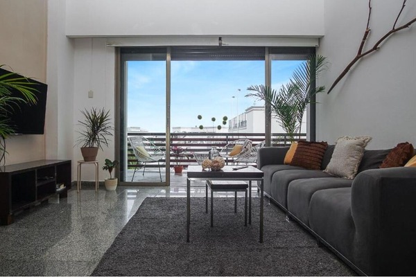 THE OPTIMISTIC ONE | Área de estar | TV