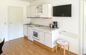 Fridge, stovetop, coffee/tea maker, cookware/dishes/utensils