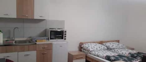 1 chambre, fer et planche Ă repasser, Wi-Fi, draps fournis