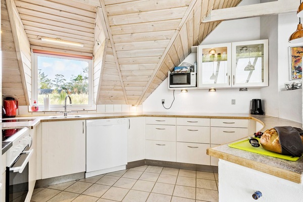 Frigorifero, piano cottura, lavastoviglie, macchina per tè/caffè