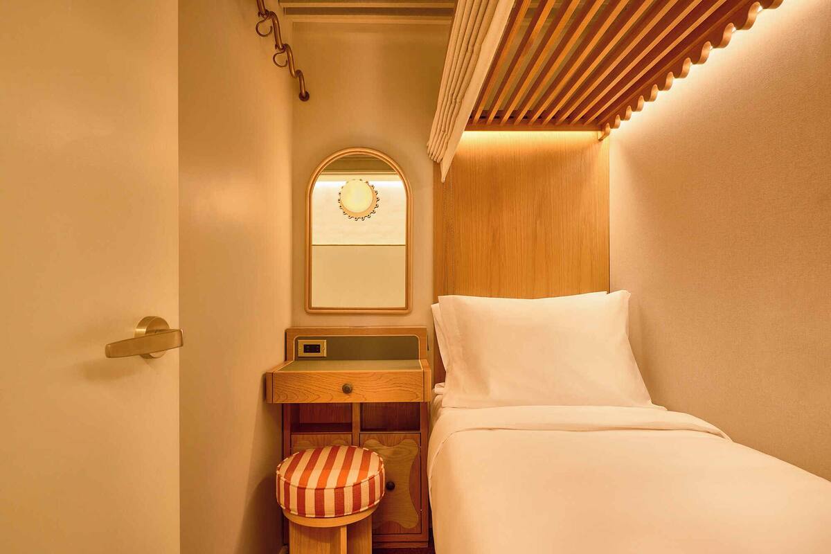 Premium bedding, memory foam beds, desk, laptop workspace