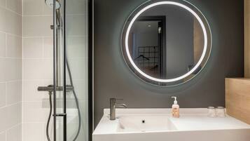 Shower, eco-friendly toiletries, hair dryer, towels
