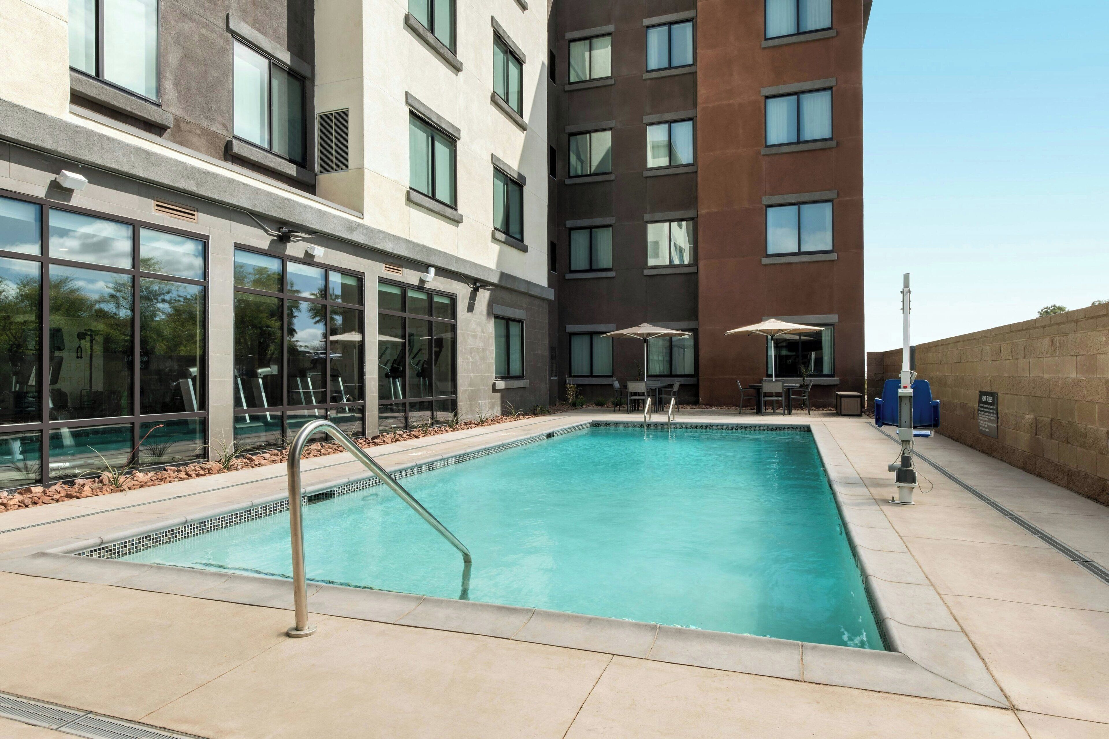 Outdoor pool, open 8:00 AM to 10:00 PM, pool umbrellas, sun loungers