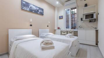 1 chambre, fer et planche Ă repasser, Wi-Fi, draps fournis