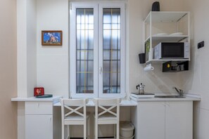 Fridge, stovetop, cookware/dishes/utensils