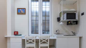 Fridge, stovetop, cookware/dishes/utensils