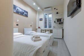 1 chambre, fer et planche Ă repasser, Wi-Fi, draps fournis