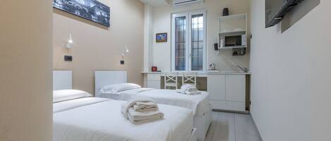 1 habitación, tabla de planchar con plancha, wifi y ropa de cama