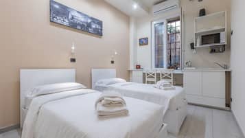 1 habitación, tabla de planchar con plancha, wifi y ropa de cama