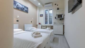 1 chambre, fer et planche Ă repasser, Wi-Fi, draps fournis