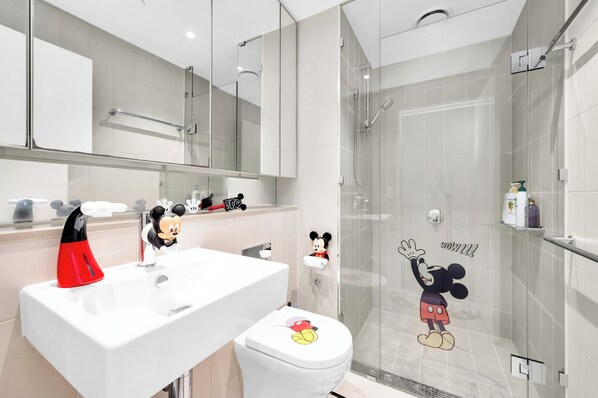 Shower, hair dryer, towels, soap
