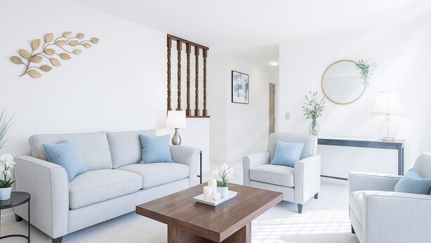 A modern living room with a light grey sofa, a wooden coffee table, and a white armchair. - Spacious 3 BR 2B House Sunnyvale Park (Sunnyvale)