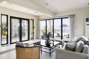 Villa Deluxe, balcon, vue plage | Coin séjour