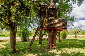 Children's area - Apartment 'Principina tra mare e natura' with Shared Pool, Wi-Fi and Air Conditioning (Principina Terra)