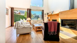 TV, fireplace, books, stereo