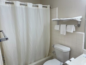 Basic Single Room | Bathroom | Hair dryer, soap, shampoo, toilet paper - American Inn Motel (Pratt)