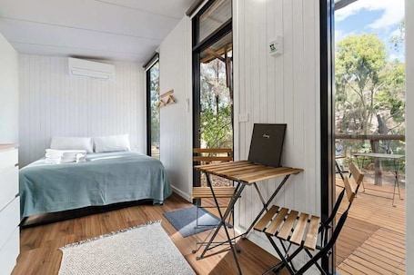 1 bedroom, bed sheets. The Edge of Nowhere Chestnut by Tiny Away