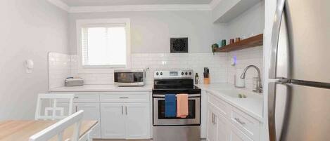 Fridge, microwave, dishwasher, coffee/tea maker