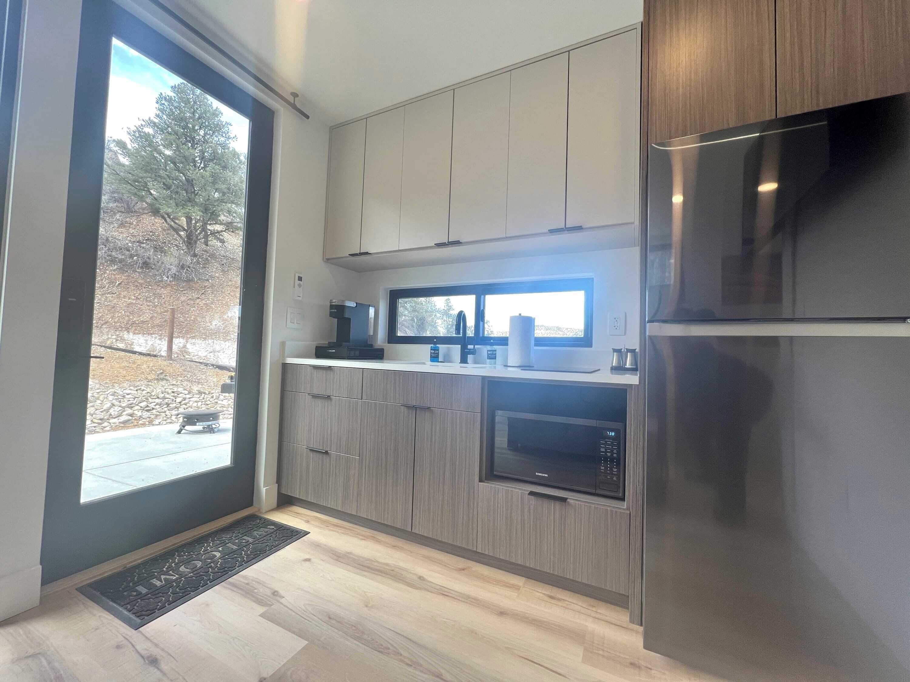 Fridge, microwave, stovetop, coffee/tea maker