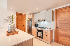 Fridge, oven, toaster, cookware/dishes/utensils