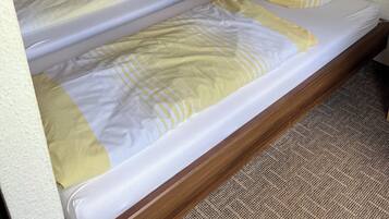 1 bedroom, travel crib, bed sheets