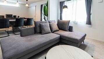 Grandioso Okinawa Pool Villa Onna 8D | Living area | Flat-screen TV