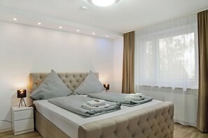 1 habitación, tabla de planchar con plancha, wifi gratis y ropa de cama 