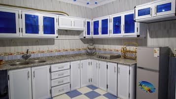 Fridge, coffee/tea maker, electric kettle, toaster